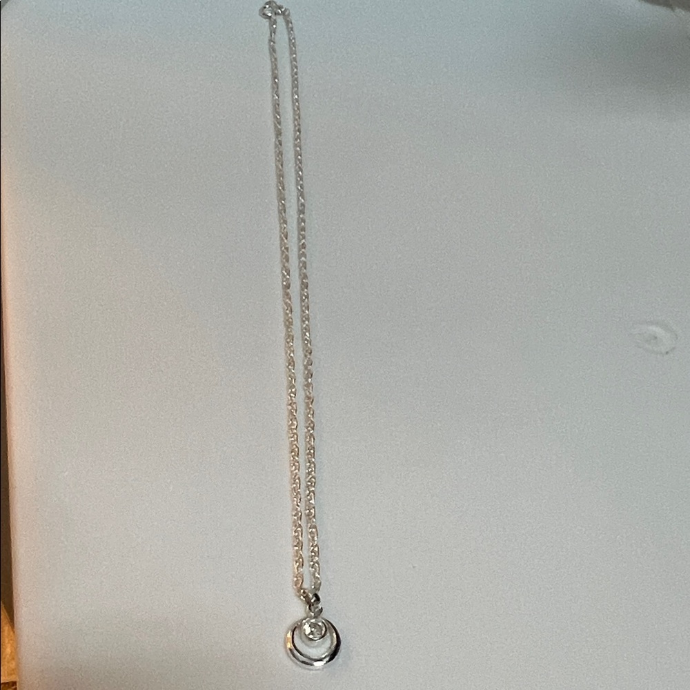 Elegant 18” Sterling silver Necklace with round pendant with cz. Gently preowned